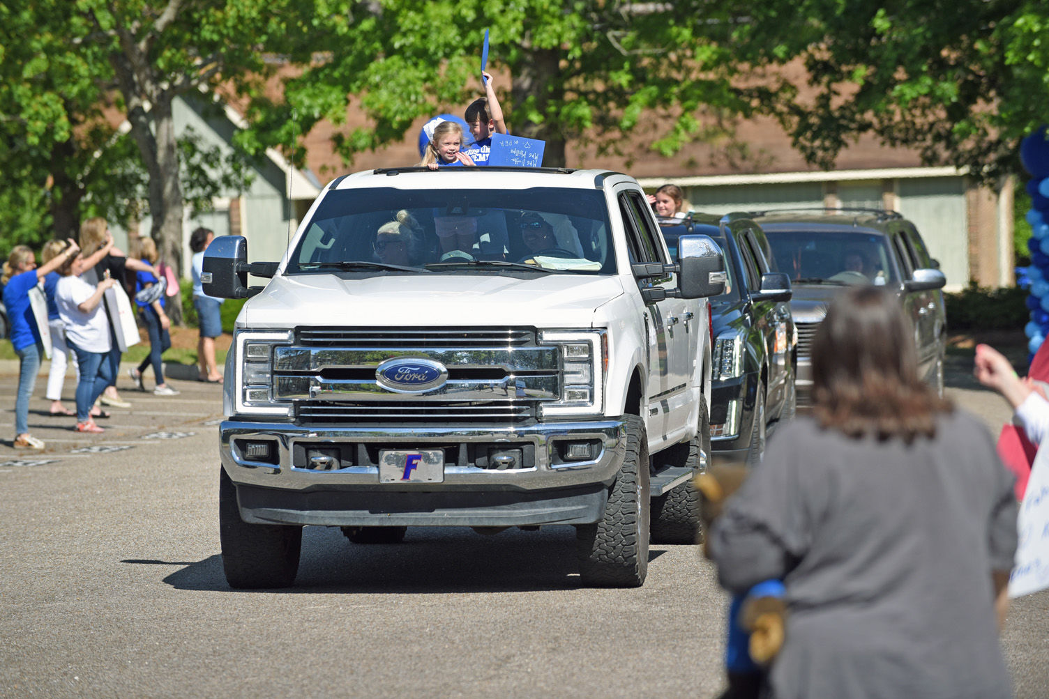 Teachers hold parade for students at Houston Academy